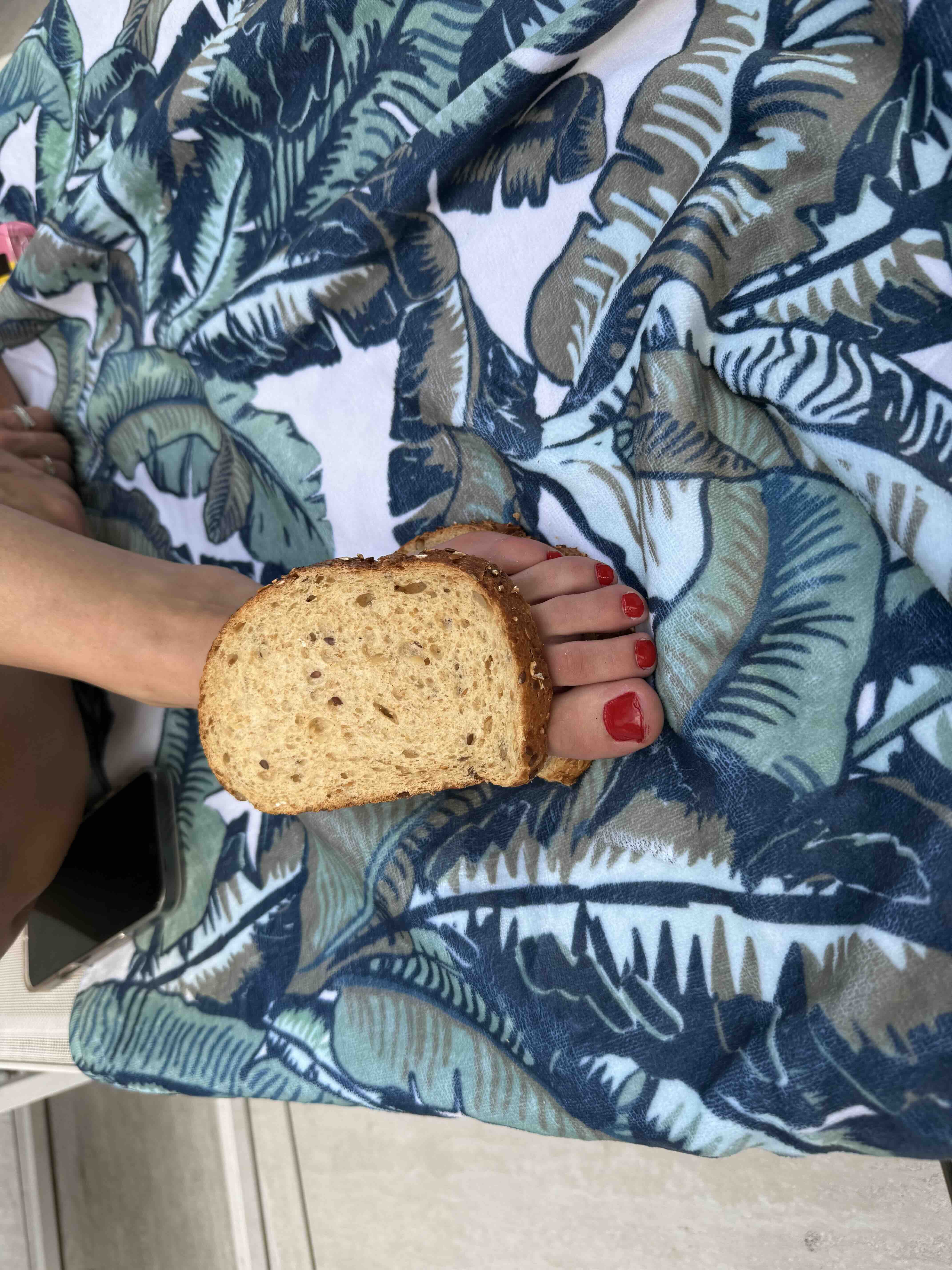 Foot sandwich on patterned towel